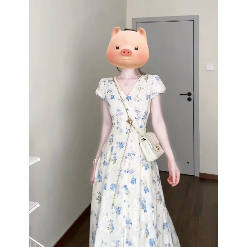 连衣裙女2025夏季新款法式气质V领泡泡袖收腰开叉碎花中长款裙子