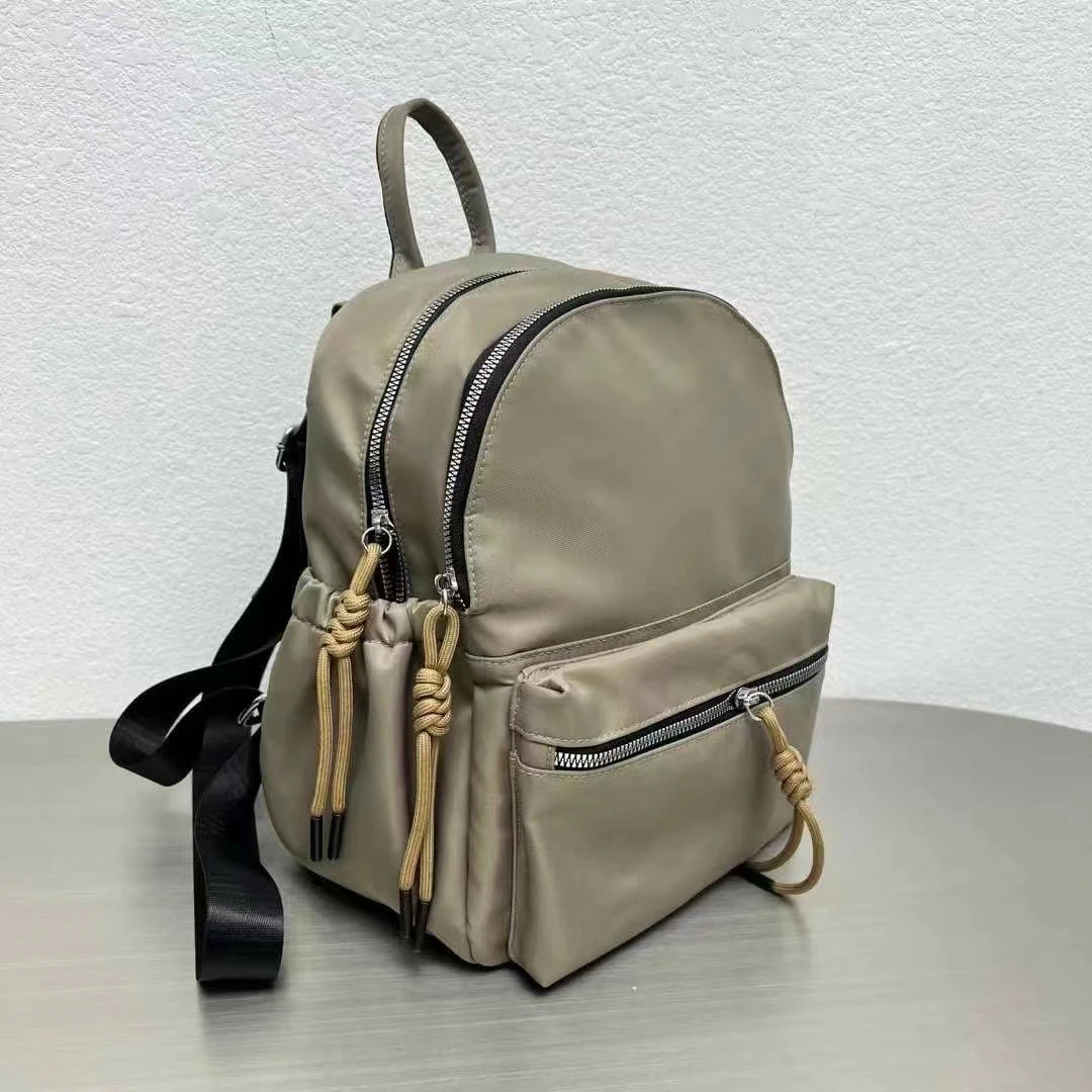 小众简约百搭小背包高级感休闲防水轻便双肩包大学生通勤包妈咪包