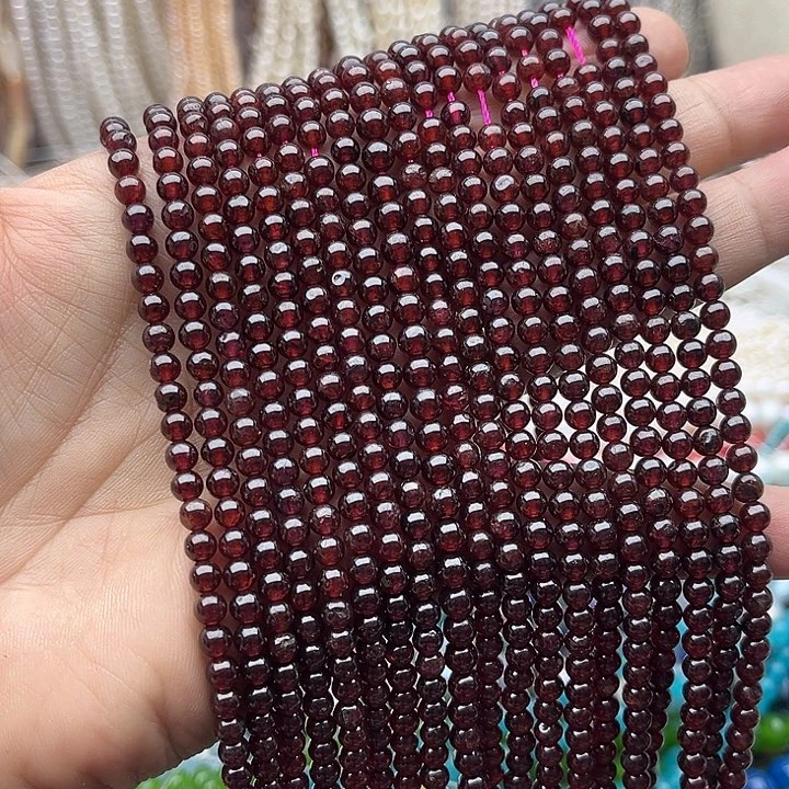 玛瑙/玉髓未镶嵌珠宝半成品一条4mm左右石榴石几颗有瑕