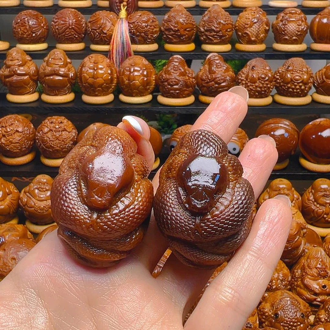 欢***哥手串/手链橄榄核初级玉华蛇一对