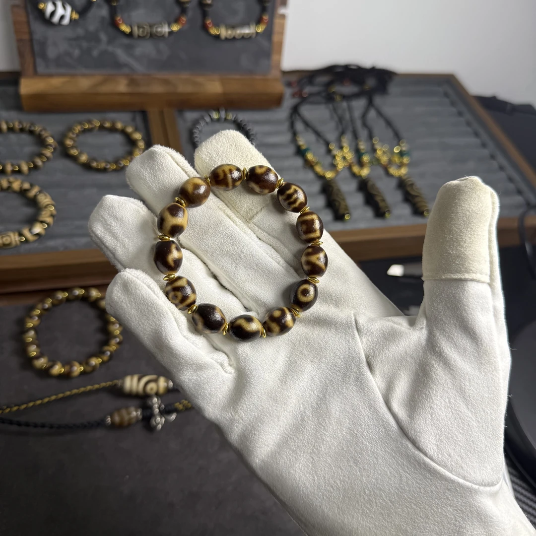 藏系牙黄多宝达洛手串