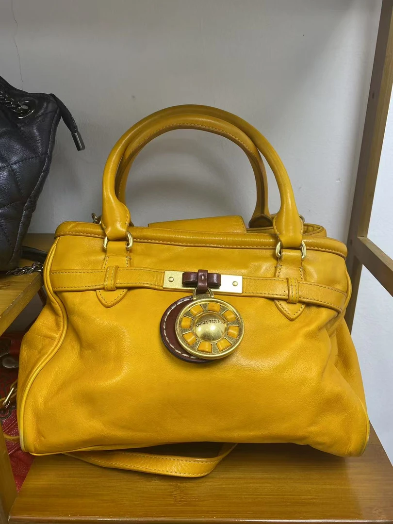 单肩单肩包女士黄色橘色斜跨包手拎包枕头包机车色肩包