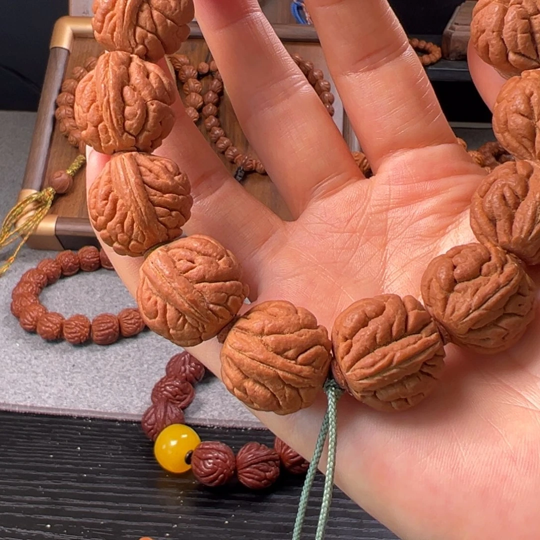 东***东桃核吊坠22霸王龙元宝