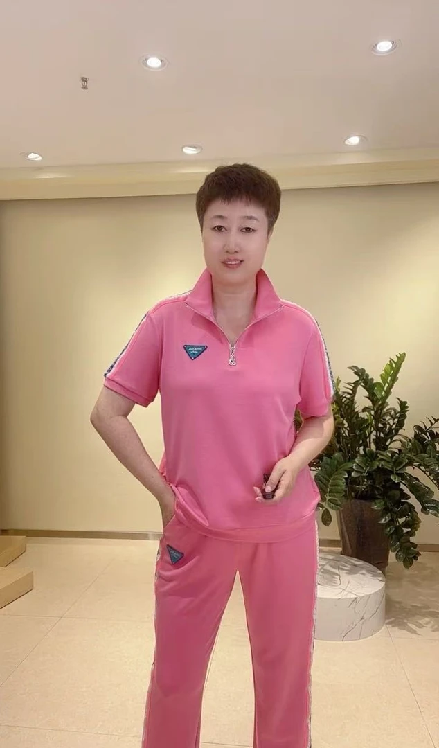 嘉莉丹:5925#时尚减龄彩色织带立领半拉链束口休闲套装