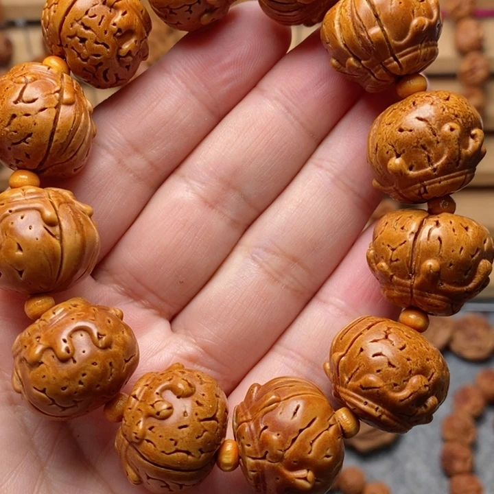 桃核雕刻蜜罐手串