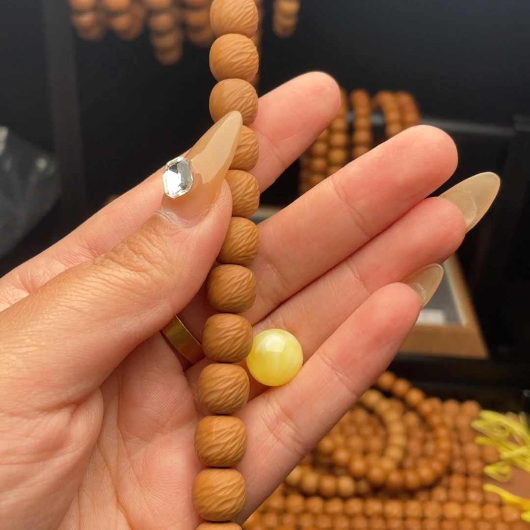 吃****手串桃核云锦全品