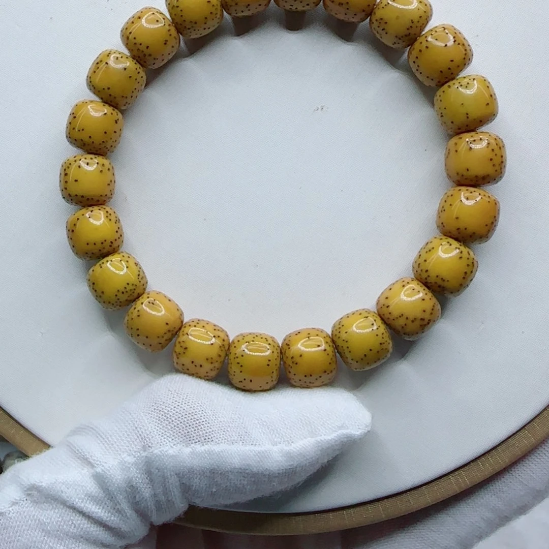 星月菩提手串鸡油黄10.5×9.5同枝果a12