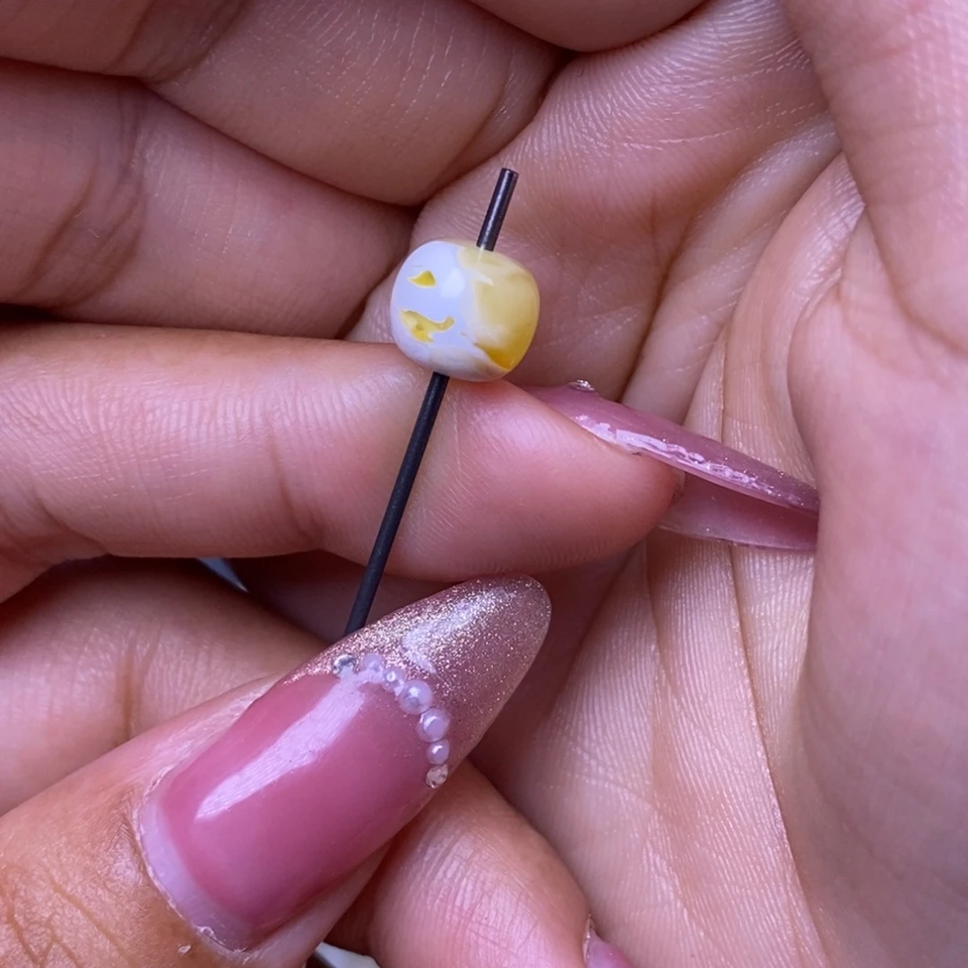 琥珀未镶嵌裸石漆白橘金溶洞妖花老型8.8*7.8mm
