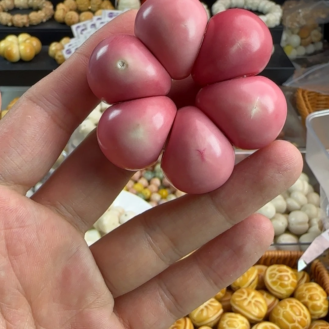S****手串菩提根/象牙果瑕疵粉色蒜瓣手捻1个