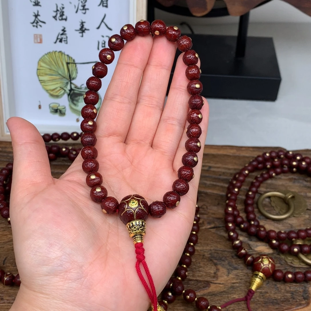 凤眼菩提吊坠8.8金钉手持