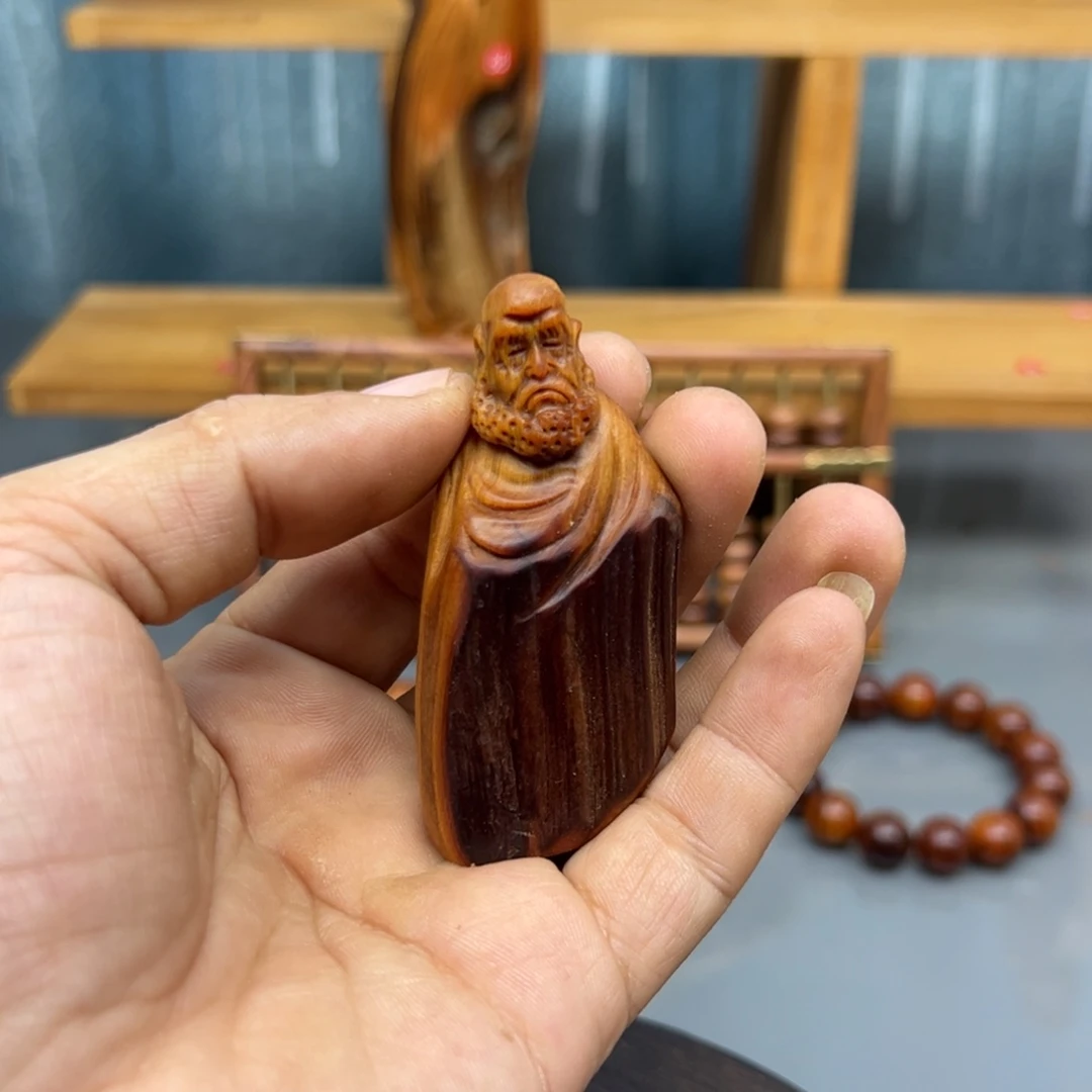 心***题木崖柏木摆件手把件