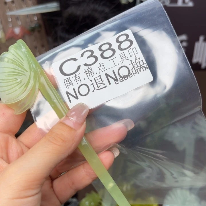 蛇纹石玉发饰合金钸**笙