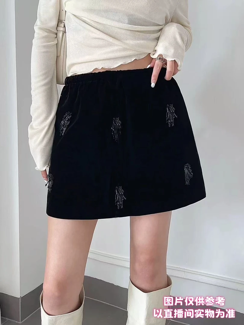 丰*秋冬重工串珠流苏松紧腰短裙防走光女A字版遮肉大码显瘦百搭