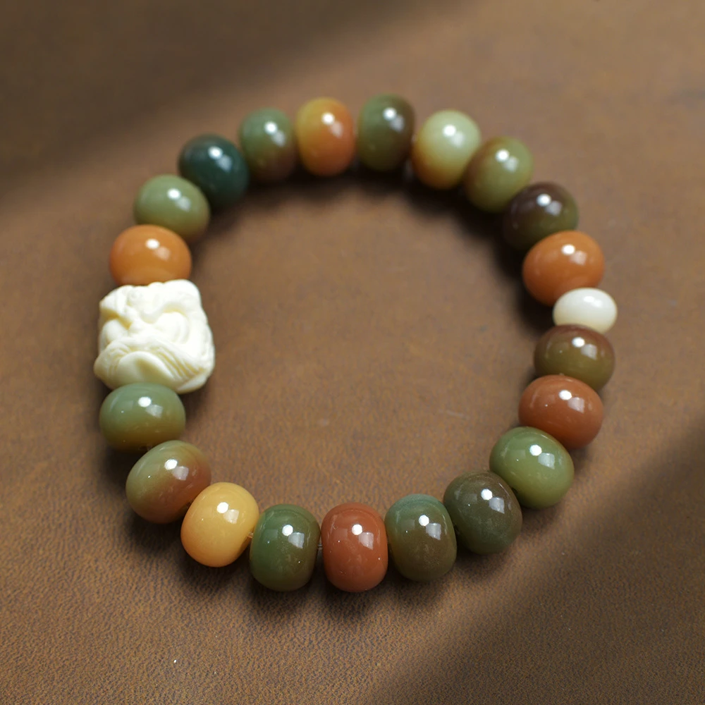 065苹牙果醒狮手串