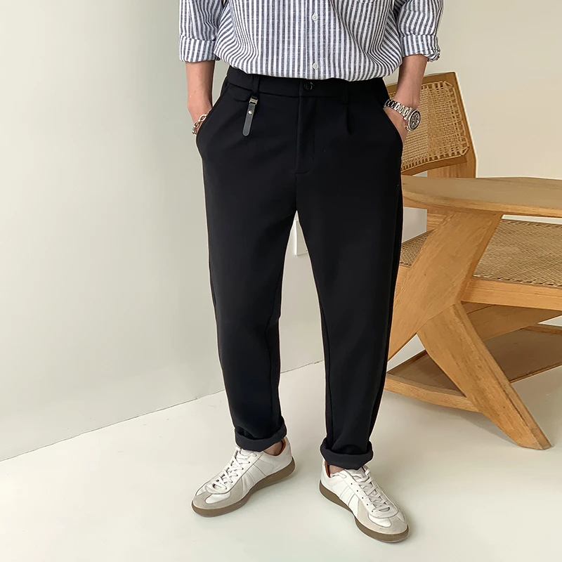 徐太浪简约黑色大码青年休闲裤男2025新款春秋潮流百搭小脚裤长裤