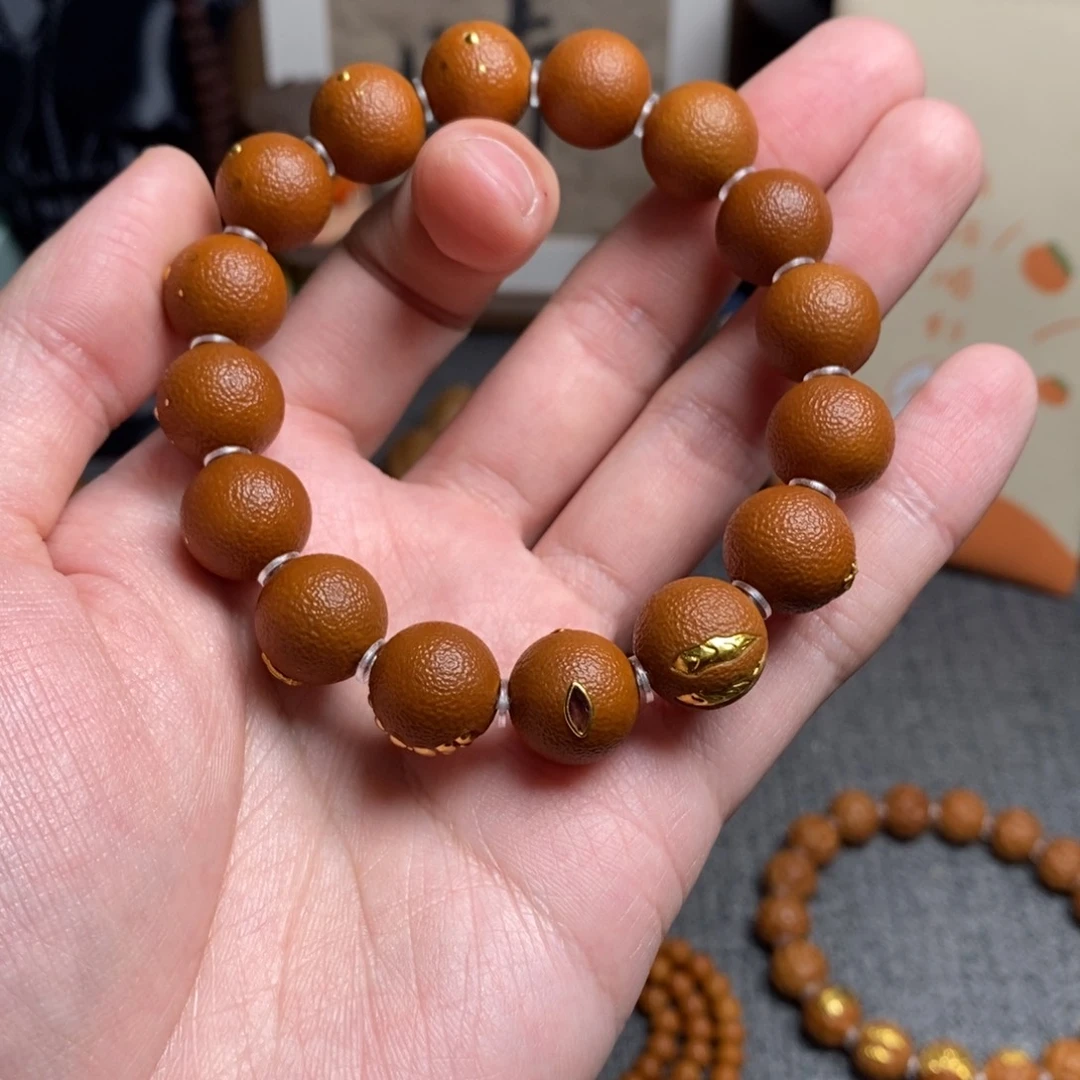 手串橄榄核国***?橘皮耀月吞金兽
