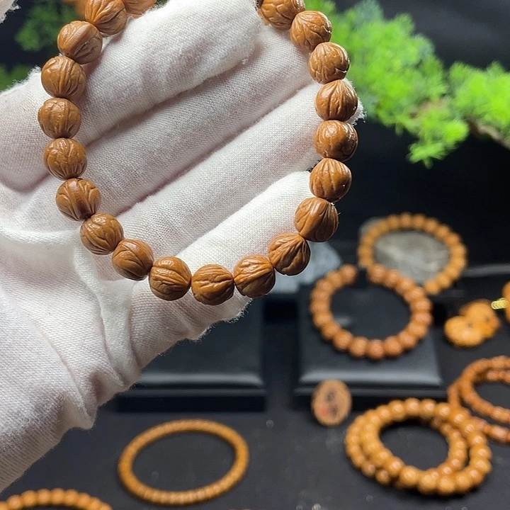 人***欢桃核吊坠秦岭龙纹桃核