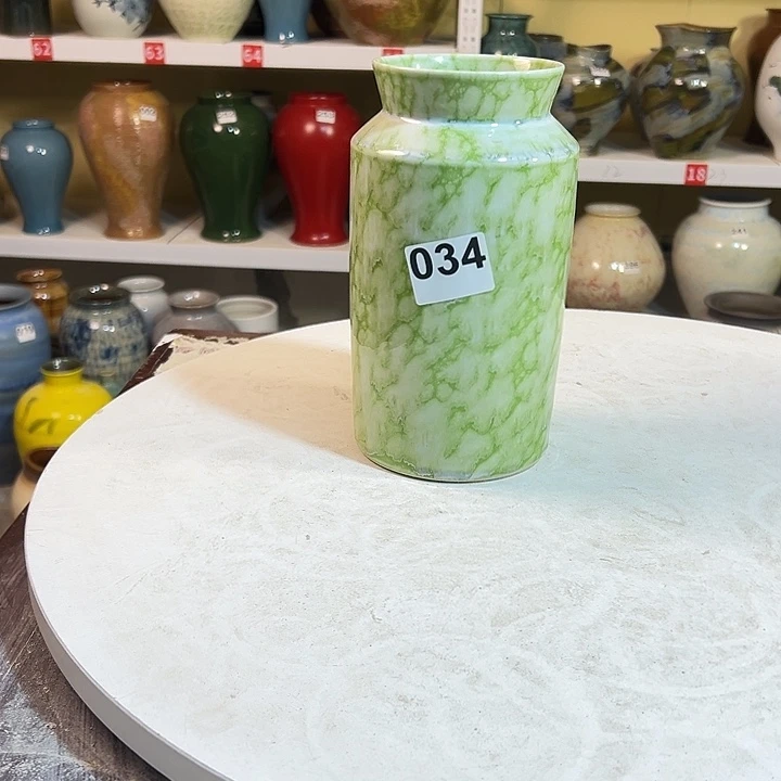 白泥花瓶高21口8。034