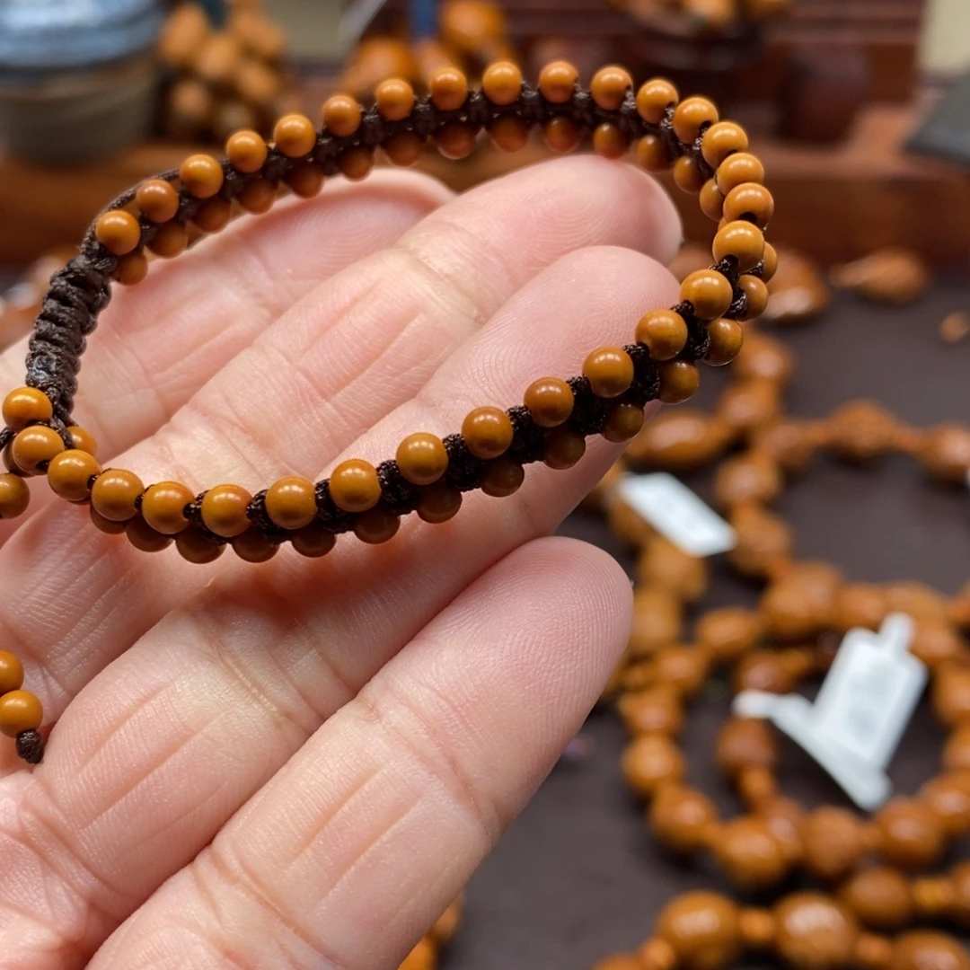 手工编织橄榄核素串