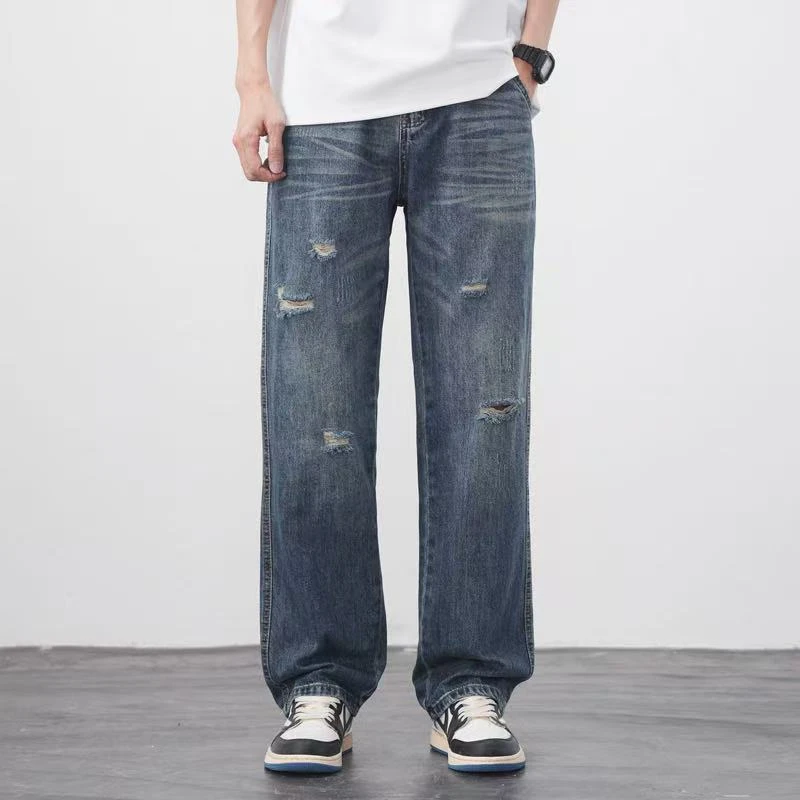 时尚男士破洞水洗蓝色肶骨带小皮标宽松直筒裤春夏牛仔裤夏季春夏