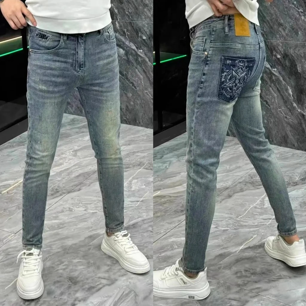 潮牌痞帅复古弹力长裤子男2025新款高端破洞牛仔裤男士修身小脚裤