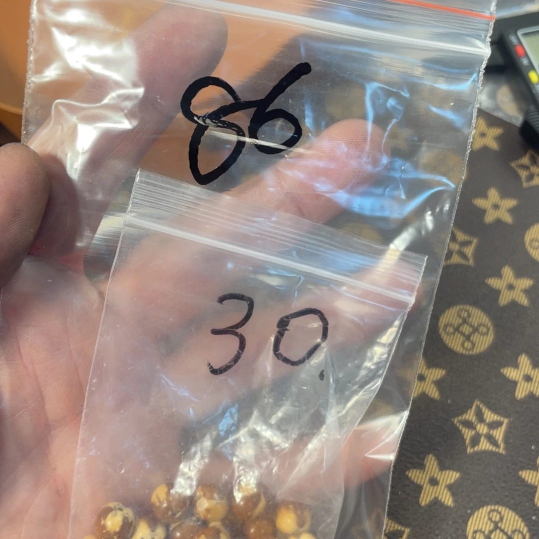 蘸***啊紫金鼠手串实心散珠86