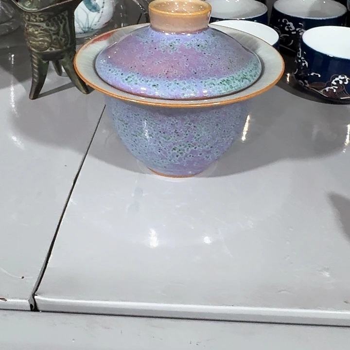 主人杯一个，瓷。。。品茗