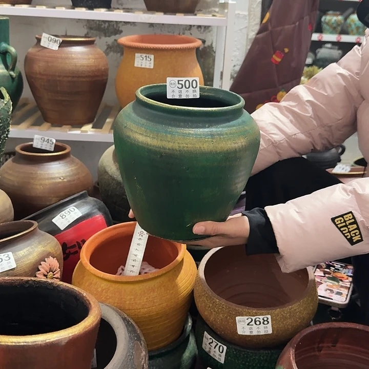 瑕疵金绿坛子500高度20口径14窑裂