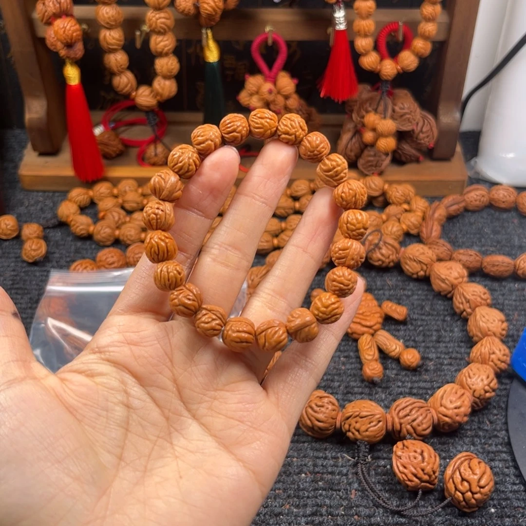 藏***锋桃核吊坠桃枭手串L3