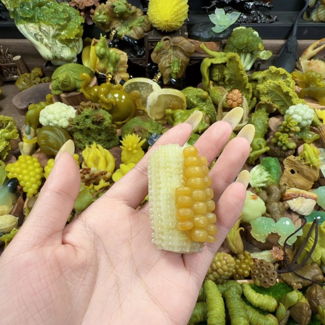 琬***儿蛇纹石玉未镶嵌手把件