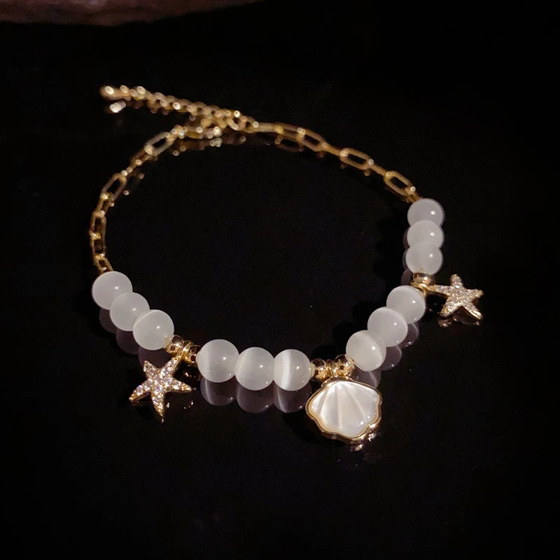 铜镀真金仿珍珠手链 小清新通透简约贝壳海星猫眼石手链ins