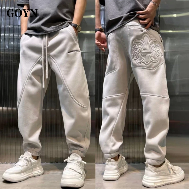GOYN冬季新款男士刺绣束脚卫裤2025轻奢潮流百搭防寒保暖休闲长裤