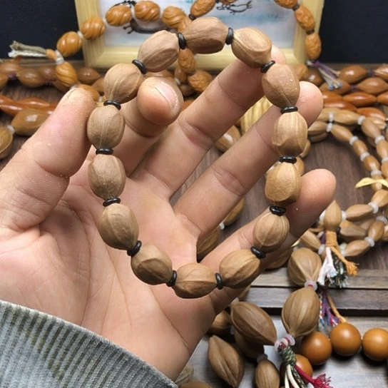 橄榄核吊坠蜜桃臀