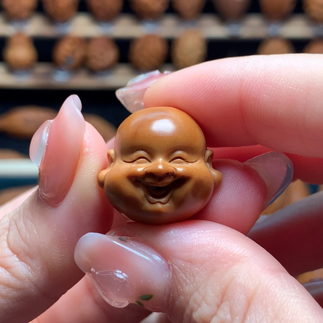 橄榄核把件开心头