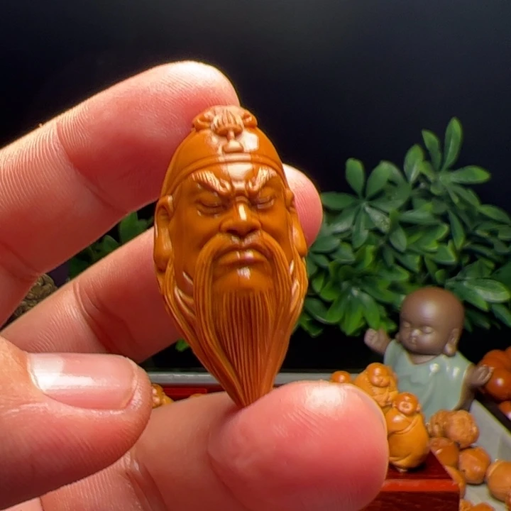 橄榄核吊坠系**别橄榄核