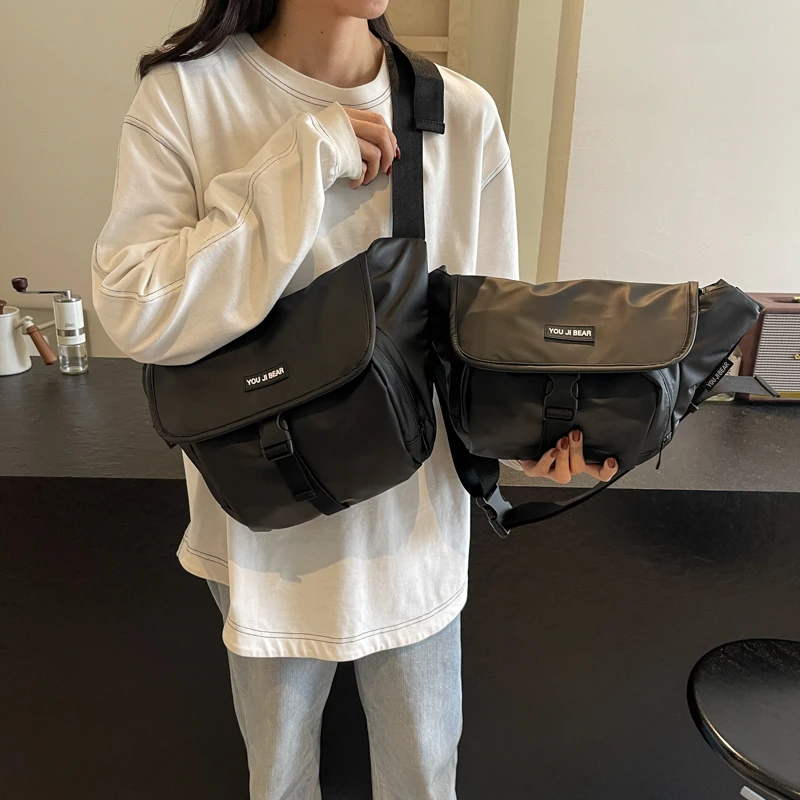 男女防水包包2025新款百搭骑行运动休闲斜挎包大容量单肩饺子包