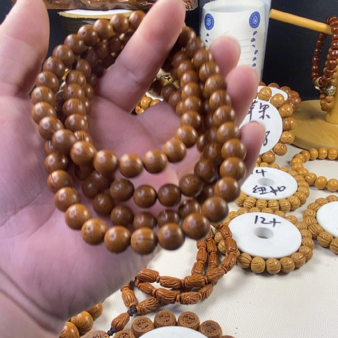 魅***）桃核光珠工艺品444