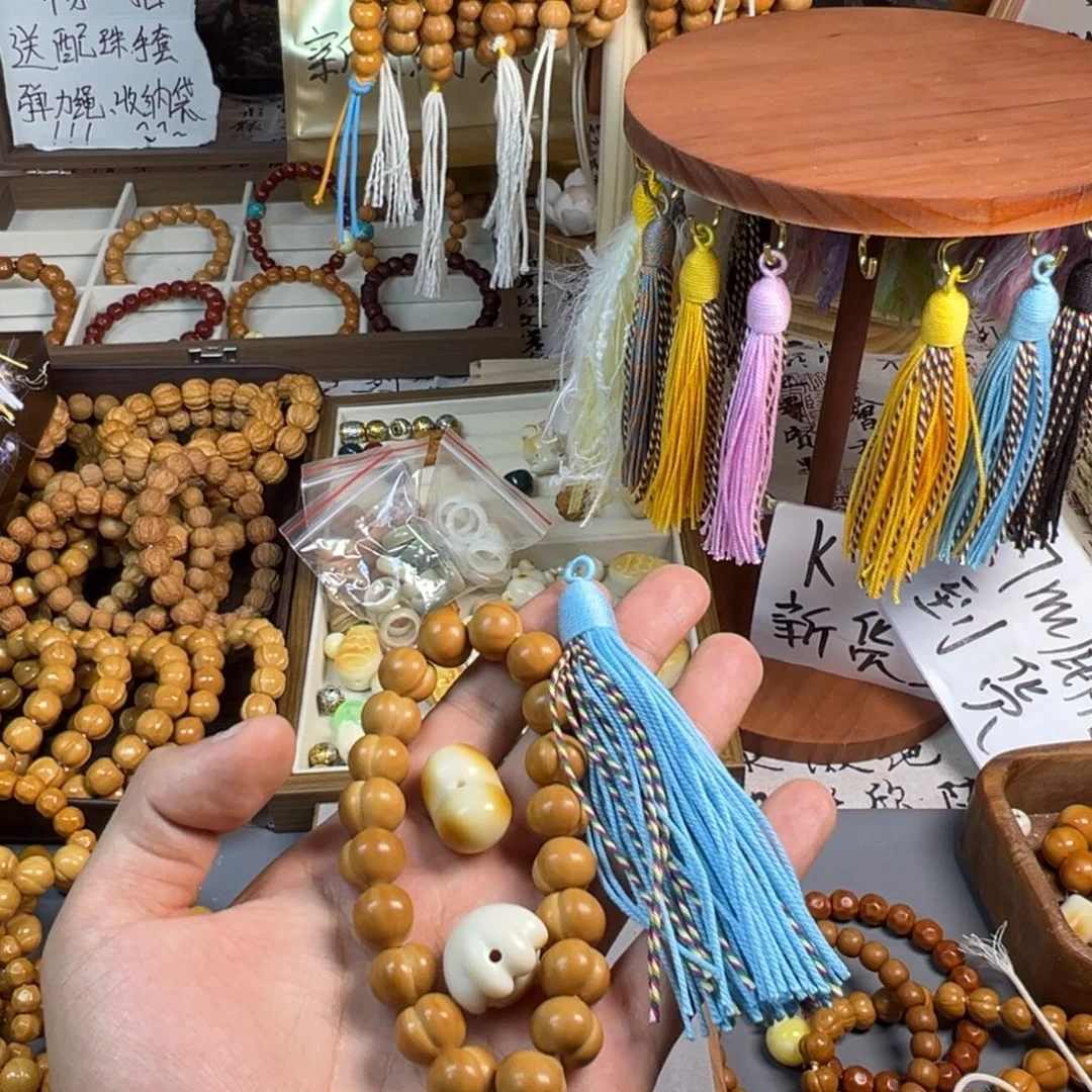 瑾***你猴头核桃手串柯基屁屁，象牙果✖️2，流苏