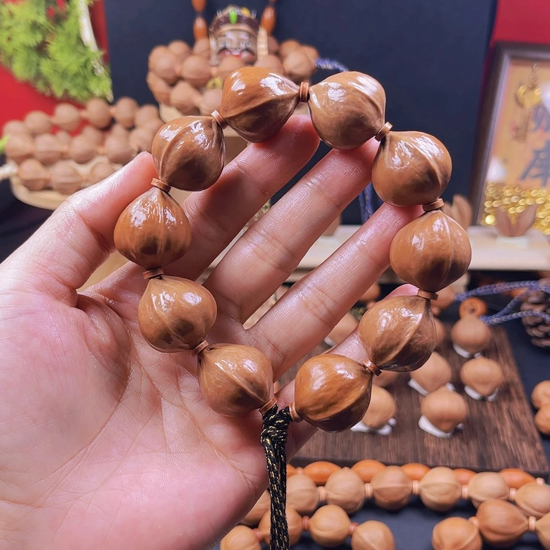 橄榄核吊坠梅林铁核毕业款短圆饱满，一物一拍