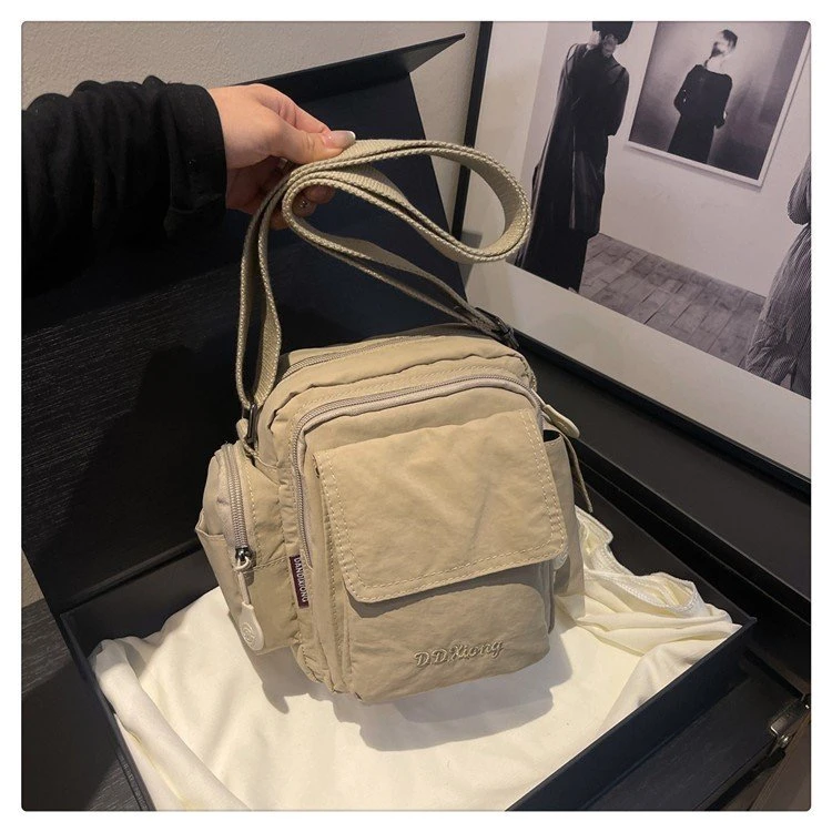 夏季上新休闲百搭手机包2025新款简约便携小包