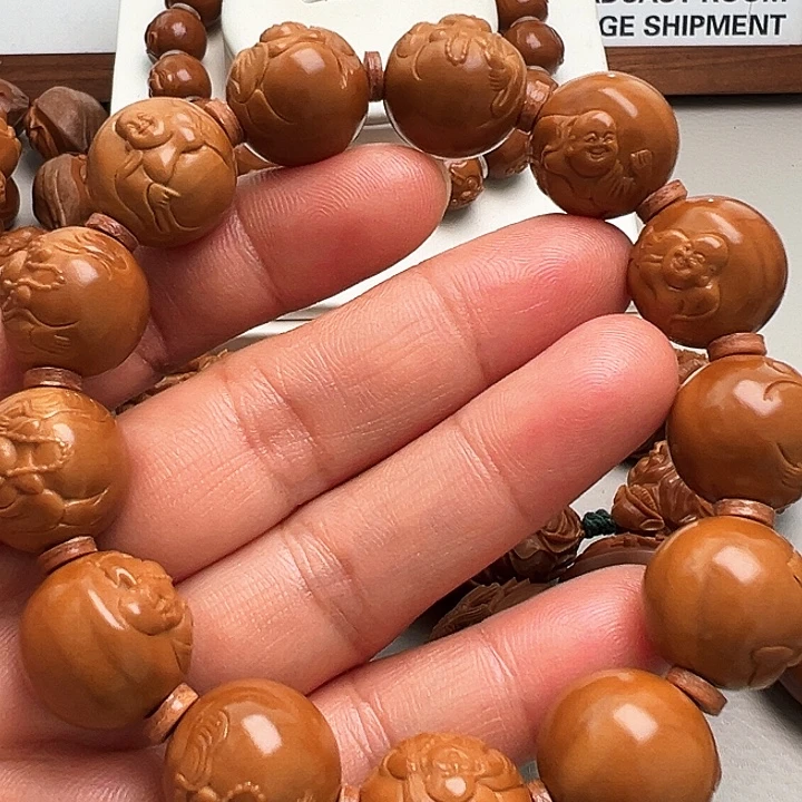 橄榄核手串/手链正圆弥勒