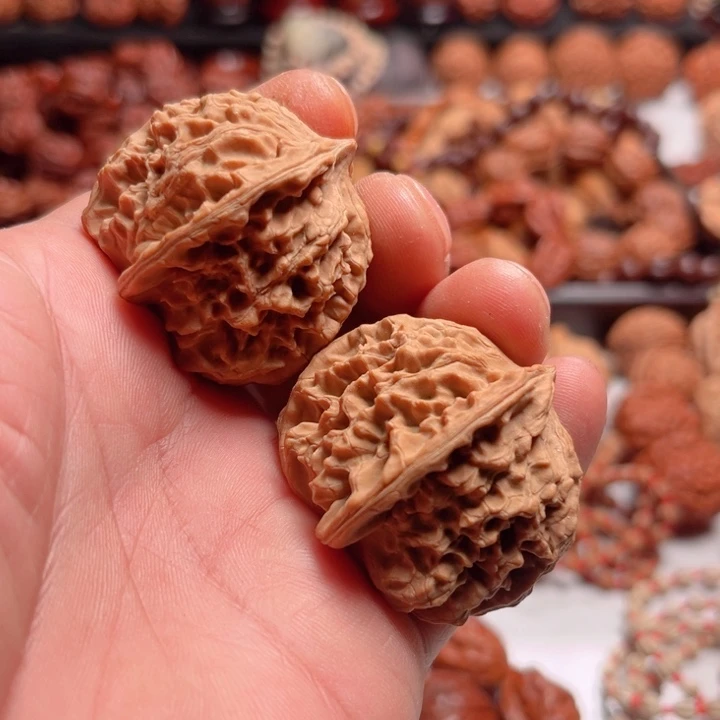 文玩核桃把件野生太行凤眼元宝树头