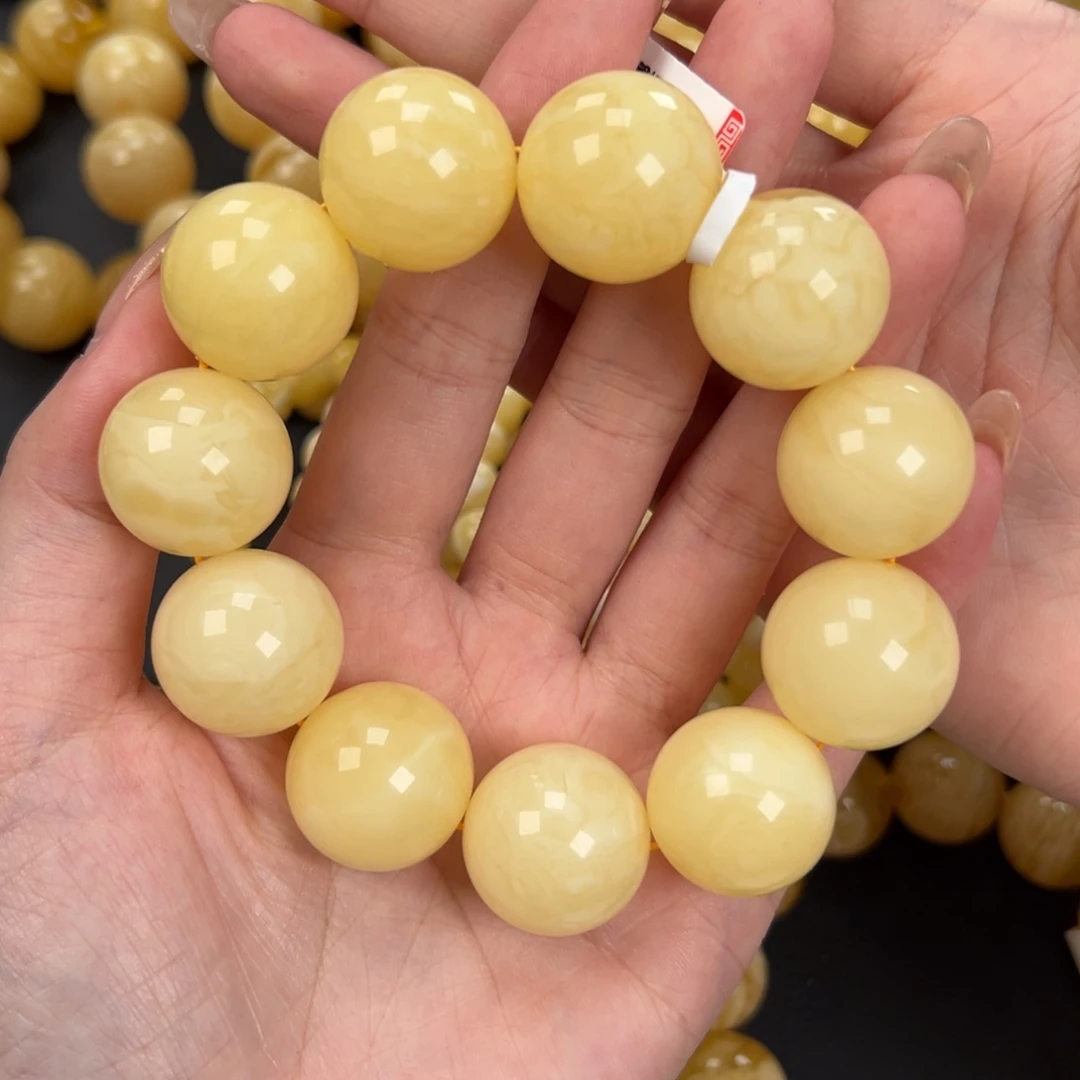 凯***心琥珀未镶嵌手链60白蜡