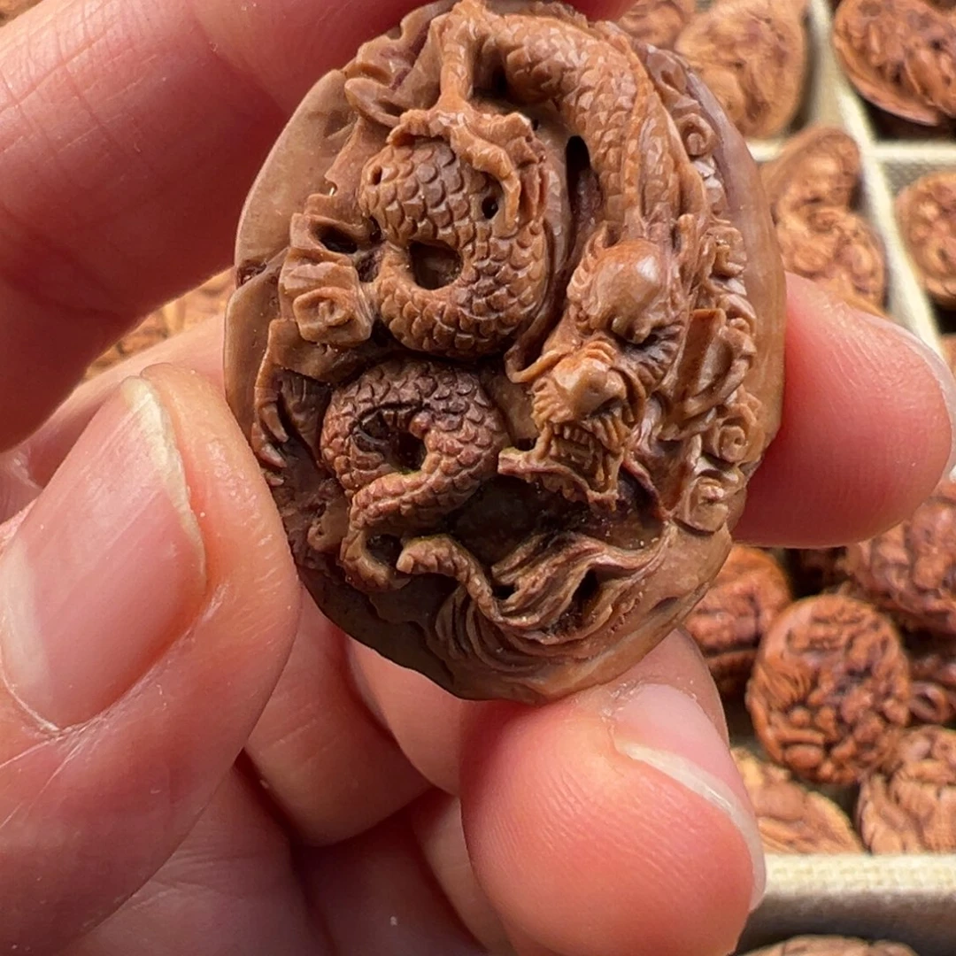 桃核手串?*鱼桃核雕刻龙单粒，特价款，不退不换，