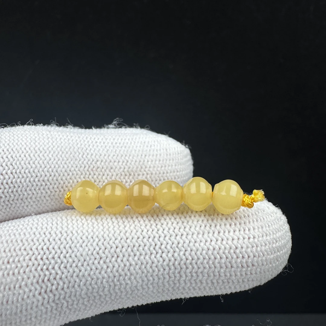 K4113天然原矿蜜蜡 隔珠5.7mm支持复检假一罚十