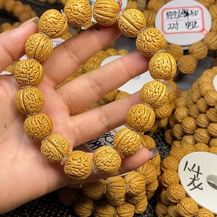 冬****桃核手串虎皮肌肉1.7