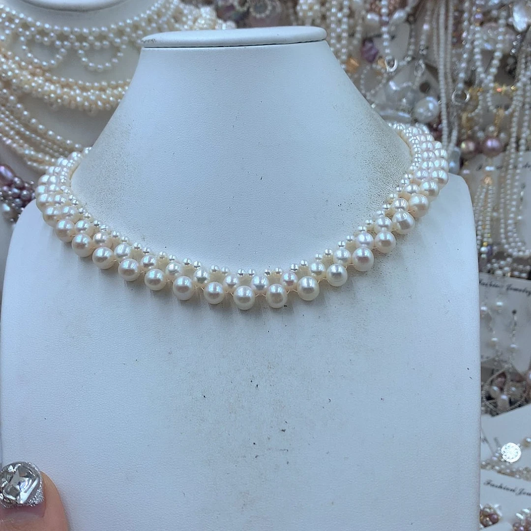 俏***主淡水珍珠耳饰银S925镶嵌