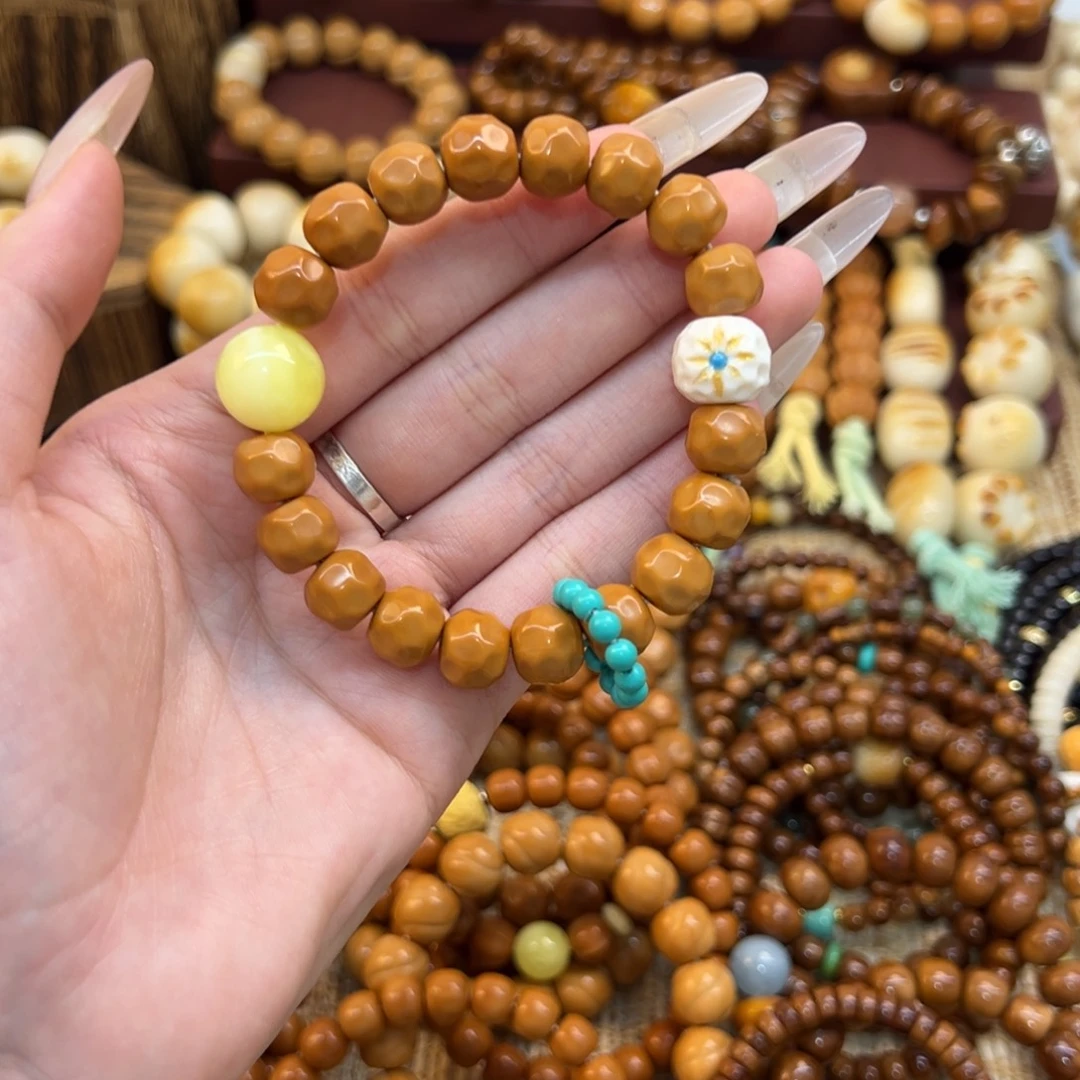 米****猴头核桃手串搭配圆珠太阳花跑环