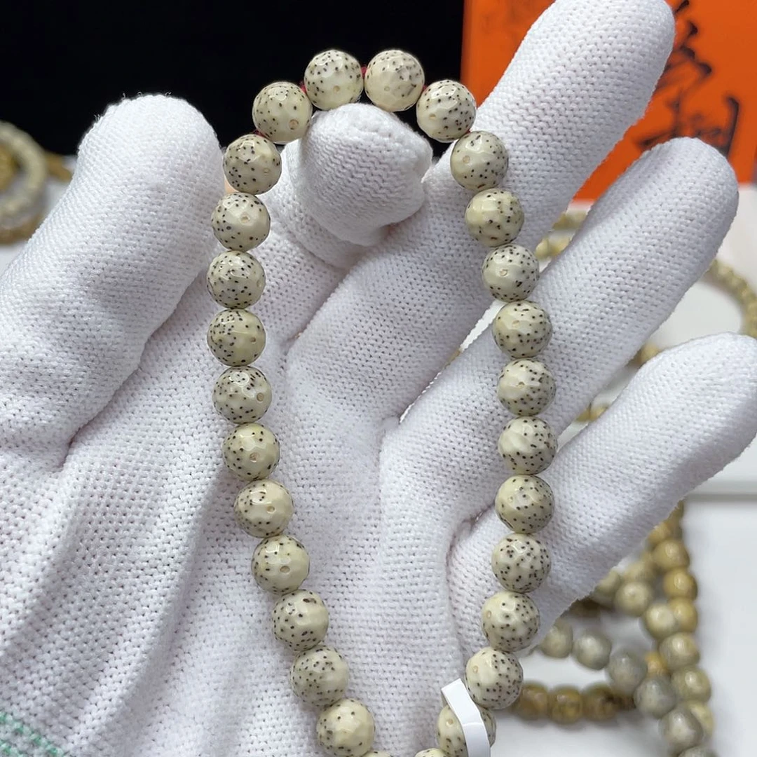 星月菩提吊坠12。8/8骨瓷白圆珠龙鳞雕刻