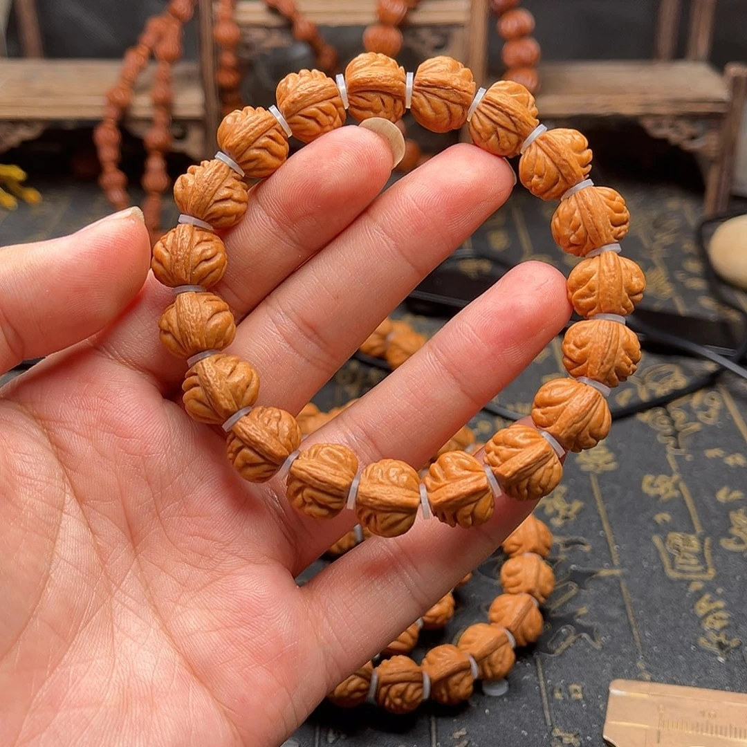 吊坠桃核小金豆手串